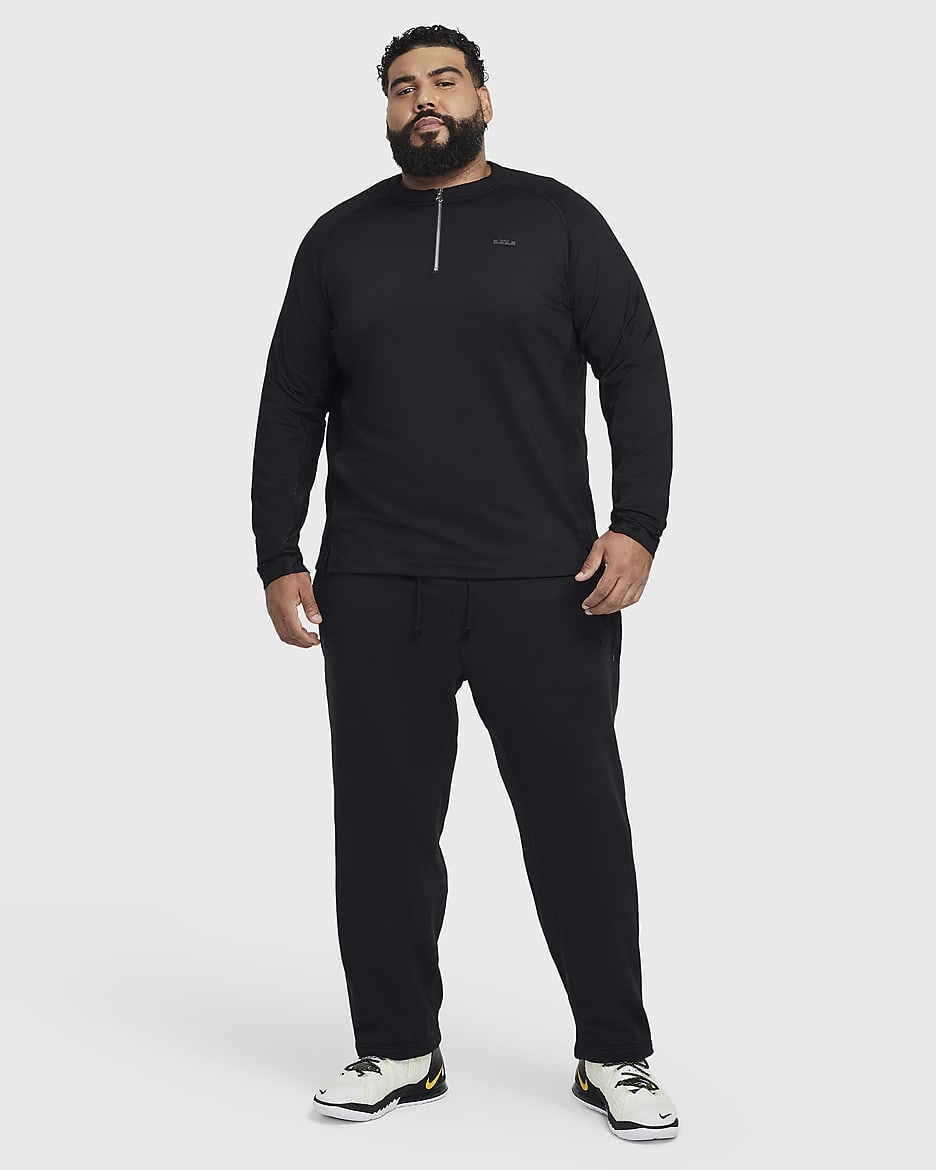 LeBron Standard Issue Men s Therma FIT Basketball Pants. Nike